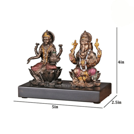 Lord Ganesha And Goddess Lakshmi On Lotus