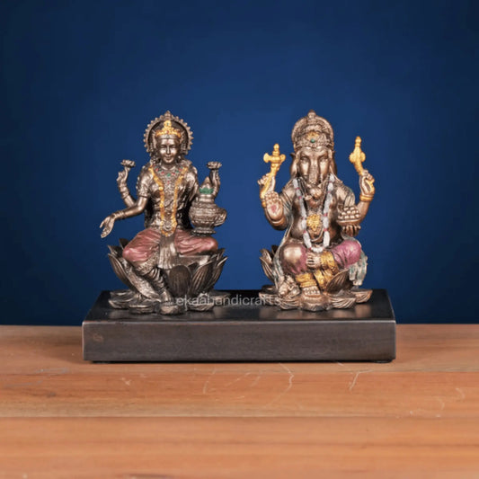 Lord Ganesha And Goddess Lakshmi On Lotus