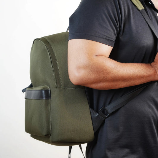 Minimalist Olive Green Backpack Bag for Men with Curved Top & Black Leather Pocket